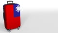 Traveler`s suitcase with flag of Taiwan. Taiwanese tourism conceptual 3D rendering, blank space for caption Royalty Free Stock Photo