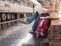 Traveler sitting and looking at the map Royalty Free Stock Photo