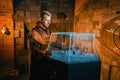 Traveler solving ancient puzzles in the dungeon