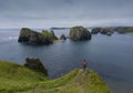 Traveler Standing on a Cliff and Looking on Beautiful Unnamed Bay, Shikotan Island, Coastline of Pacific Ocean, Russia.