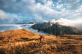 Traveler stands at Tre Cime di Lavaredo in Dolomites, Italy Royalty Free Stock Photo