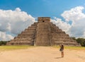 Traveler takes a photo of Pyramid in Chichen Itza, Temple of Kukulkan. Yucatan, Mexico Royalty Free Stock Photo