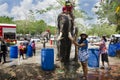 Traveler thai woman posing and travel join with Songkran Festival is celebrated in a traditional thai New Year at Ayutthaya Royalty Free Stock Photo