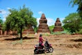 Traveler thai woman ride motorcycle travel around Ancient City in Bagan