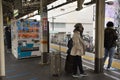 Tthai women and Japanese people wait and walk up and down journey with MRT Tozai Line go to Ginza at Kasai Station in Tokyo, Japan Royalty Free Stock Photo