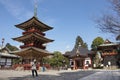 Traveler thai women looking map and reading guide book about Daitou Pagoda of Naritasan Shinshoji Temple at Chiba in Tokyo, Japan