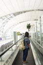 Traveler thai women use smartphone take photo with ticket and passport in Airport