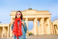 tourist woman at Brandenburg Gate or Brandenburger Tor at sunset Royalty Free Stock Photo