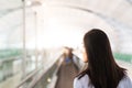 Traveler with travel bag or luggage walking in the airport terminal walkway for air traveling. blur motion Royalty Free Stock Photo