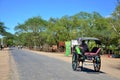 Traveler use horse drawn carriage for travel around ancient city bagan