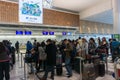 A traveler waiting to check-in before departure at New Chitose Airport, Hokkaido, Japan