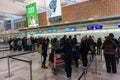 A traveler waiting to check-in before departure at New Chitose Airport, Hokkaido, Japan