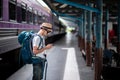 Traveler waits train at train station