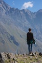 A traveler watching on mountain landscape, Kazbeg mountain - Kazbegi (Stepantsminda), Georgia