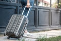 Traveler woman carrying luggage. Tourist walking with Suitcases Travel lifestyle concept Royalty Free Stock Photo