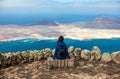 Traveler woman enjoying beautiful seascape at viewpoint