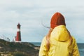 Traveler Woman enjoying Norway lighthouse sea landscape Travel Lifestyle solitude concept scandinavian vacations outdoor Royalty Free Stock Photo