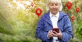 Traveler woman hands use map on mobile phone app to search for route location of place with gps on street when travel in