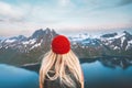 Traveler woman hiking outdoor in Norway travel adventure vacations healthy lifestyle blonde hair girl hiker Royalty Free Stock Photo