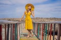 Traveler woman joy fun relaxing on wood bridge looking beautiful destination island. Tourism natural scenic landscape