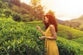 Traveler Woman With Tea Leaf During Travel to Tea Plantations in Sri Lanka Royalty Free Stock Photo