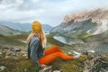 Traveler woman relaxing in mountains alone hiking outdoor active lifestyle vacations adventure Royalty Free Stock Photo