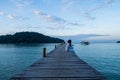 Traveler woman is relaxing on wood bridge in beautiful island, koh kood island, Trat Thailand