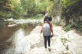 Traveler woman in river