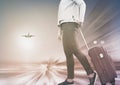 Woman with suitcase awaiting aircraft