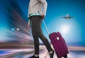 Woman with suitcase awaiting aircraft Royalty Free Stock Photo