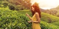 Traveler Woman With Tea Leaf in Hand During Her Travel to Famous Nature Landmark Tea Plantations in Sri Lanka Royalty Free Stock Photo