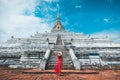 Traveler woman travel in Wat Phu Khao Thong pagoda temple at Ayutthaya historical park Thailand Royalty Free Stock Photo