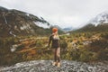 Traveler woman walking alone in foggy forest mountains Royalty Free Stock Photo