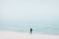 Traveler woman walking on beach Traveling alone