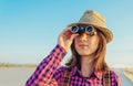 Traveler young woman looking through binoculars Royalty Free Stock Photo