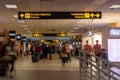 Travelers in the busy international airport of Lima, Peru