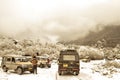 Travelers car halt on a foggy winter road. Indian National highway with a car stopping by at the roadside which is very dangerous Royalty Free Stock Photo