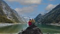 Travelers couple team look on the mountain landscape. Travel and active life concept as Adventure travel Royalty Free Stock Photo