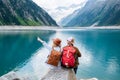 Travelers enjoy the view of the mountain valley. Travel and active life concept with team. Adventure and travel Royalty Free Stock Photo