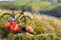 Travelers having rest in Alpine meadow Royalty Free Stock Photo