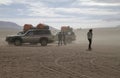 Travelers and jeeps caught in a sand storm in Bolivia