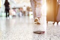 Travelers lost their wallet on the floor at the airport Royalty Free Stock Photo