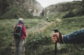 Travelers In The Mountains, Trekking Pole In The Hand Of A Traveler Person Close-up. Wanderlust Travel Lifestyle Vacation Concept