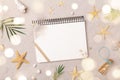 Travelers notebook with accessories on sand background top view. Planning summer holidays, trip and vacation concept. Flat lay
