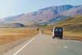 Car on the road in the Altai Mountains near the border of Russia and Mongolia Royalty Free Stock Photo