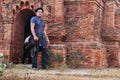 Travelers thai man people travel visit UNESCO World Heritage Site and stand posing portrait for take photo with ruins stupa pagoda