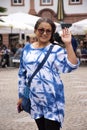 Travelers thai old woman stand and posing on street in Speyer town