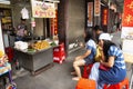 Travelers thai people waiting Chinese people cooking order Fried Tofu with vegetables and sweet sauce at restaurant in Chaozhou