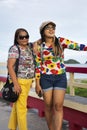 Travelers thai senior mother and young daughter women travel visit and posing portrait for take photo on Saphan saranwithi red