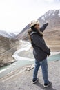 Travelers thai woman travel visit and posing portrait for take photo at view point of Confluence of the Indus and Zanskar Rivers Royalty Free Stock Photo